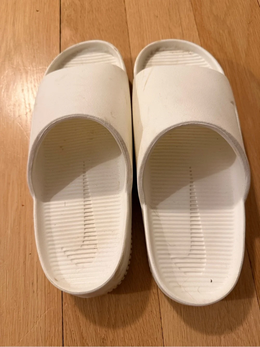 Nike White Mens Slide size 11 (or Women’s 12) Embossed Swoosh